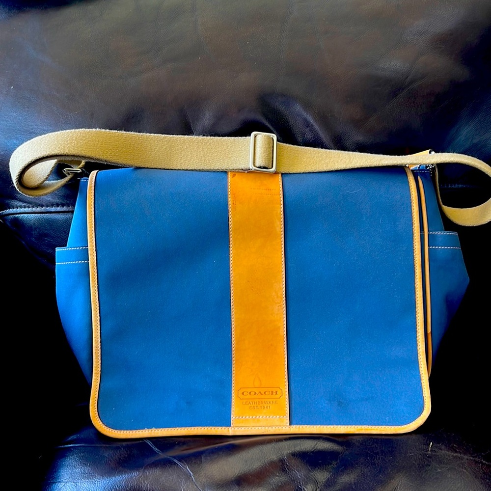 Coach woman’s canvas brief case, adjustable strap laptop cover.